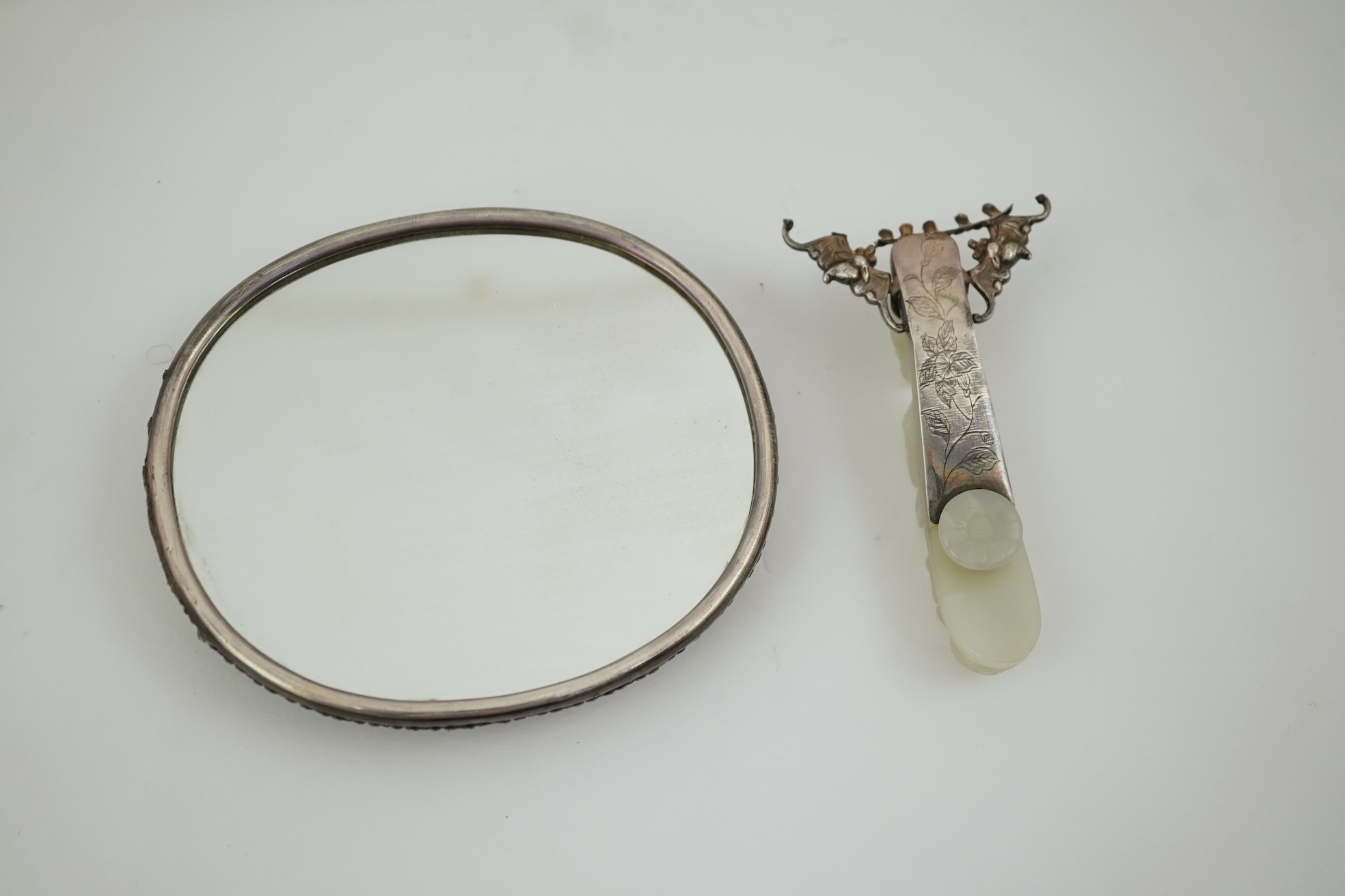 A Chinese jade and cabochon mounted hand mirror, the jade 18th/19th century